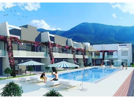 DOGANKÖYDE YEŞİLLİKLER İÇİNDE DENİZ MANZARALI DAİRELER SON 1+1