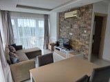 GİRNE MERKEZ KASGAR BOLGESİ HARİKA DENİZ MANZARALİ KİRALİK 1+1 FULL ESYALİ RESİDENCE DAİRE