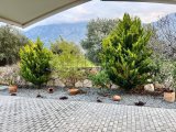 Girne-Lapta'da, Denize 200 Metre Mesafede, Yüzme Havuzlu ve Özel Tasarımlı Bahçeli Satılık Muhteşem 3+2 Lüks Villa!