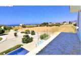 Girne-Lapta'da, Denize 200 Metre Mesafede, Yüzme Havuzlu ve Özel Tasarımlı Bahçeli Satılık Muhteşem 3+2 Lüks Villa!
