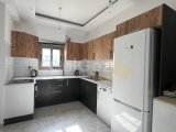 Girne Alsancak'ta Satılık 2+1 Daire - Ful Eşyalı, Ortak Havuz ve Balkon Avantajları!