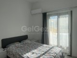 Girne Alsancak'ta Satılık 2+1 Daire - Ful Eşyalı, Ortak Havuz ve Balkon Avantajları!