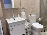 Girne Alsancak'ta Muhteşem Dağ ve Deniz Manzaralı 1+1 Yarı Eşyalı Daire