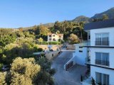 Girne Lapta'da Eşyalı 2+1 Daire: Hayalinizdeki Yaşam Alanı!