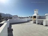 Lansman Fiyatı! 18 Ay Faızsız Ödeme! Alsancak’ta Ortak Havuzlu & Özel Çatı Teraslı Modern 2+1 Daire – 5★ Oteller ve Mare Monte & Camelot Plajlarına Yürüme Mesaf