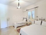 Alsancak’ta Özel Havuzlu ve Olgun Peyzajlı Seçkin 3 Yatak Odalı Villa Alsancak’ın En Tercih Edilen ve Prestijli Bölgelerinden Birinde Konumlanan Bu Zarif Villa,