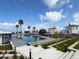 Girne Karşıyaka’da Satılık 2+1 Özel Bahçeli Daire | Site İçinde Restoran, Açık & Kapalı Havuz ve GYM