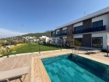 Girne Alsancakta site içerisinde satılık 2+1 daire.. ortak havuzlu