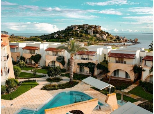 Iskele, Boğaz'da Sunrise Beach Club (1+1) Daire, İlk satır deniz - Satılık Fırsat!