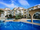 Iskele, Boğaz'da Sunrise Beach Club (1+1) Daire, İlk satır deniz - Satılık Fırsat!