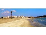 Iskele, Boğaz'da Sunrise Beach Club (1+1) Daire, İlk satır deniz - Satılık Fırsat!