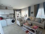 Girne Alsancakta satılık full eşyalı 2+1 daire ( ortak havuzlu )