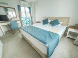 Girne Alsancak, Escape Beach Bölgesin'de Satılık, 1+1 Loft Daire, full EşyalıI, Ortak Havuzlu çok Şık Bir Site'de , Bahçe Katı, Havuz , Deniz Manzaralı