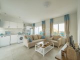 Girne Alsancak, Escape Beach Bölgesin'de Satılık, 1+1 Loft Daire, full EşyalıI, Ortak Havuzlu çok Şık Bir Site'de , Bahçe Katı, Havuz , Deniz Manzaralı