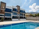 KIBRIS GİRNE ALSANCAK BÖLGESİNDE YENİ BİNADA FUL EŞYALI YÜZDE ELLİ ÖDEMEYE ANAHTAR TESLİMİ KALANINA BİR YIL VADE İMKANIYLA SATILIK 2 1 DAİRELER