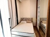 GİRNE MERKEZ'DE HAVUZLU SİTE İÇERİSİNDE SATILIK FULL EŞYALI 2+1 DAİRE
