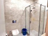 GİRNE MERKEZ'DE HAVUZLU SİTE İÇERİSİNDE SATILIK FULL EŞYALI 2+1 DAİRE