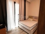 GİRNE MERKEZ'DE HAVUZLU SİTE İÇERİSİNDE SATILIK FULL EŞYALI 2+1 DAİRE