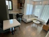 GİRNE MERKEZ'DE HAVUZLU SİTE İÇERİSİNDE SATILIK FULL EŞYALI 2+1 DAİRE