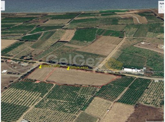Yeşilyurtta ana yol üzeri satılık arsalar