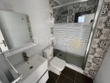 KIBRIS GİRNE ALSANCAK BÖLGESİNDE DAĞ VE DENİZ MANZARALI VE ÖZEL TERASI BULUNAN SATILIK 2+1 DAİRE