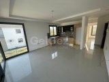 KIBRIS GİRNE ALSANCAK BÖLGESİNDE DAĞ VE DENİZ MANZARALI VE ÖZEL TERASI BULUNAN SATILIK 2+1 DAİRE