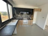 KIBRIS GİRNE ALSANCAK BÖLGESİNDE DAĞ VE DENİZ MANZARALI VE ÖZEL TERASI BULUNAN SATILIK 2+1 DAİRE