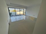 KIBRIS GİRNE ALSANCAK BÖLGESİNDE DAĞ VE DENİZ MANZARALI VE ÖZEL TERASI BULUNAN SATILIK 2+1 DAİRE