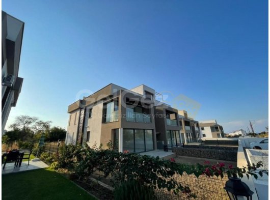 KIBRIS GİRNE ALSANCAK BÖLGESİNDE DAĞ VE DENİZ MANZARALI VE ÖZEL TERASI BULUNAN SATILIK 2+1 DAİRE