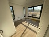 KIBRIS GİRNE ALSANCAK BÖLGESİNDE DAĞ VE DENİZ MANZARALI VE ÖZEL TERASI BULUNAN SATILIK 2+1 DAİRE