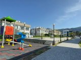 KIBRIS GİRNE ALSANCAK BÖLGESİNDE HAVUZLU SİTE İÇERİSİNDE, DAĞ VE DENİZ MANZARALI, BAHÇE KATI VEYA TERAS SEÇENEKLERİ SUNAN SATILIK 2+1 LÜKS DAİRELER!! ÜSTELİK UY