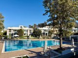 Girne'nin Alsancak bölgesinde havuzlu sitede satılık 2+1 daire!