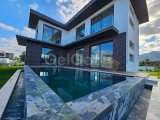 Çatalköy'de Denize 250 Metre Mesafede Satılık 6+1 Triplex Villa
