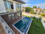 Çatalköy'de Denize 250 Metre Mesafede Satılık 6+1 Triplex Villa