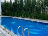 Girne'nin Doğanköy bölgesinde havuzlu sitede satılık 2+1 daire
