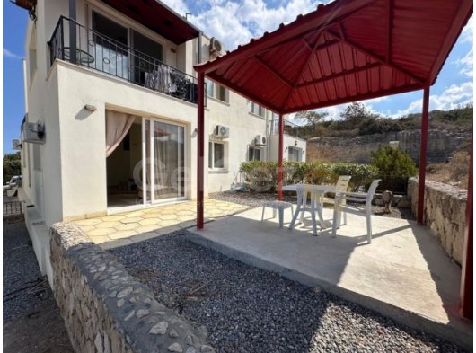GİRNE ESENTEPE’de 1+1 KİRALIK DAĞ DENİZ MANZARALI ZEMİNKAT DAİRE