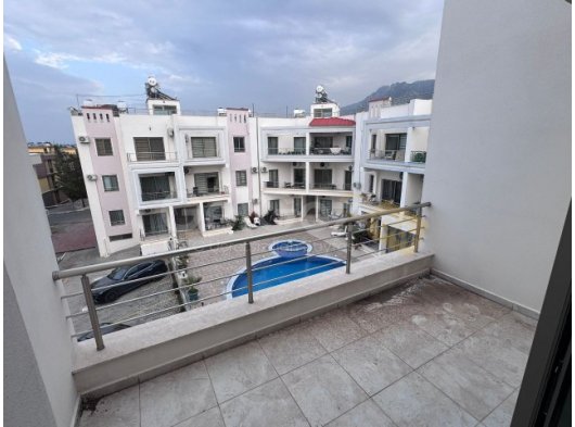 Girne Alsancak'ta Satılık 2+1 Daire - Şehir ve Deniz Manzarası ile Yatırım Fırsatı!