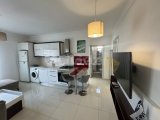Girne merkez satılık komple bina. 18 Esyali apartman + lojman 10 oda. Yuksek kira getirisi