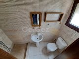 Girne Merkez'de Eşyasız, Bahçeli ve Ortak Havuzlu 3+1 Daire Satılık!
