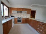 Girne Merkez'de Eşyasız, Bahçeli ve Ortak Havuzlu 3+1 Daire Satılık!