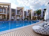 Girne Lapta'da Proje Aşamasındaki Eşyalı Daire! Bahçe ve Havuz Keyfi Sizi Bekliyor!