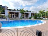 Girne Lapta'da Proje Aşamasındaki Eşyalı Daire! Bahçe ve Havuz Keyfi Sizi Bekliyor!