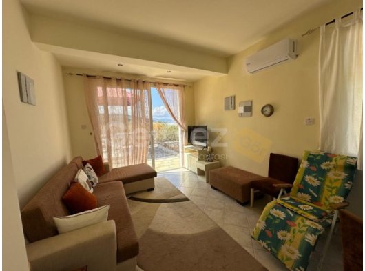 GİRNE ESENTEPE’de 2+1 KİRALIK DAĞ DENİZ MANZARALI ZEMİNKAT DAİRE