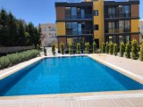Alsancak bölgesinde ortak havuzlu ve çatı tersalı 2+1 daire