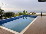 Girne Esentepe'de Deniz ve Dağ Manzaralı Şık Villa!