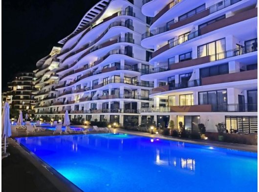 Girne Merkez'de havuzlu sitede satılık 2+1 daire