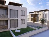 Alsancak, Girne’de Satılık 2+1 Daire – Özel Bahçe ve Çatı Terası ile Akdeniz Keyfi!