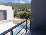 Girne Alsancak'ta Yeni, Manzaralı 1+1 Daire - Satılık Fırsatı!