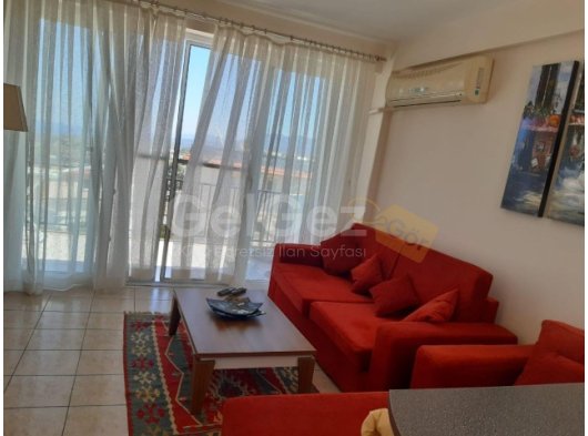 Girne/Arapköy'de satılık 2+1 havuzlu site içerisinde daire