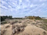 1963 öncesi İngiliz tapu senedine sahip, turizm amaçlı, denize sıfır konumda, bodrum katlı 3 katlı otel inşa izni bulunan, toplam 12.000 m²'lik arsa